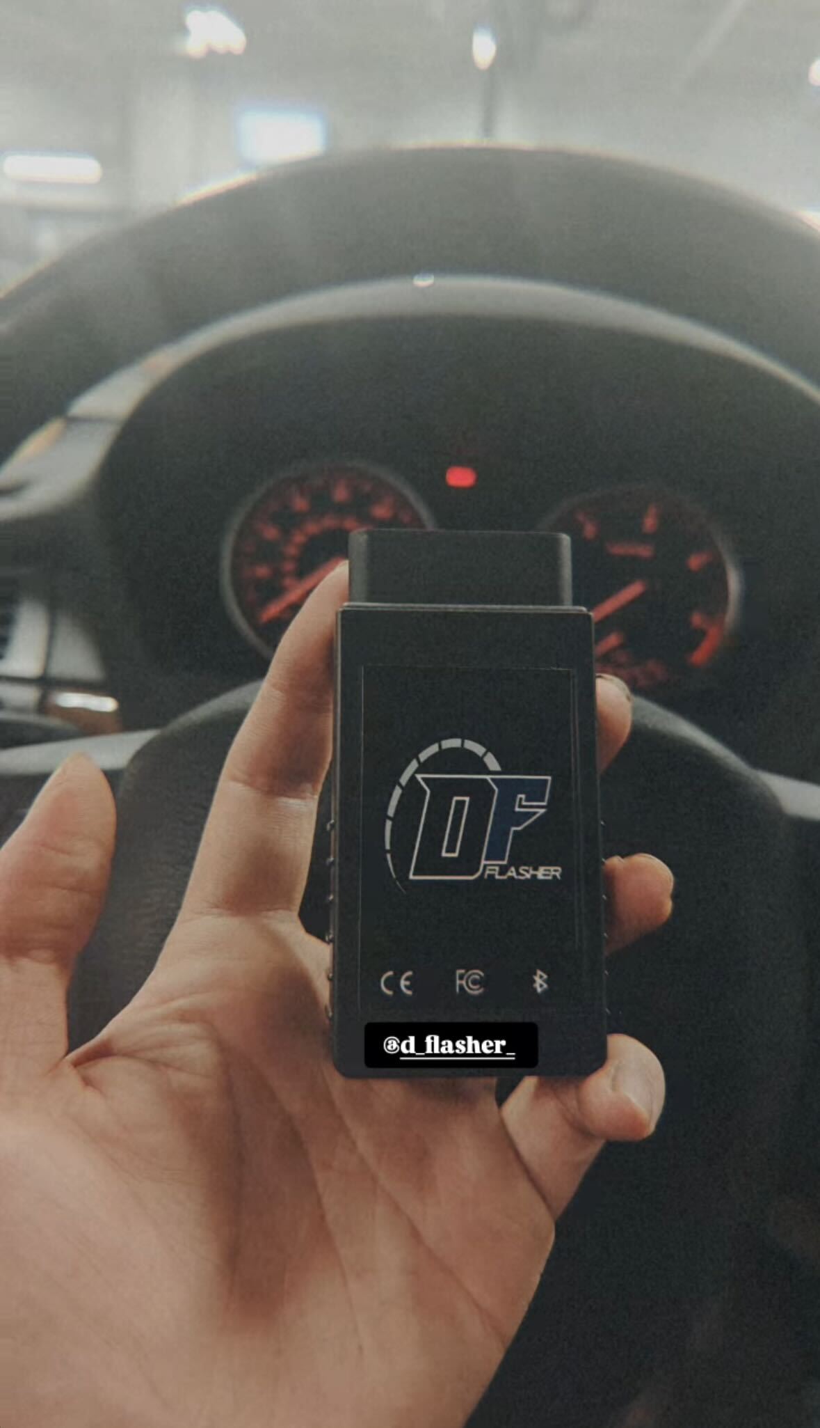 BMW X5 35d with DFlasher app showing tuning stages on phone